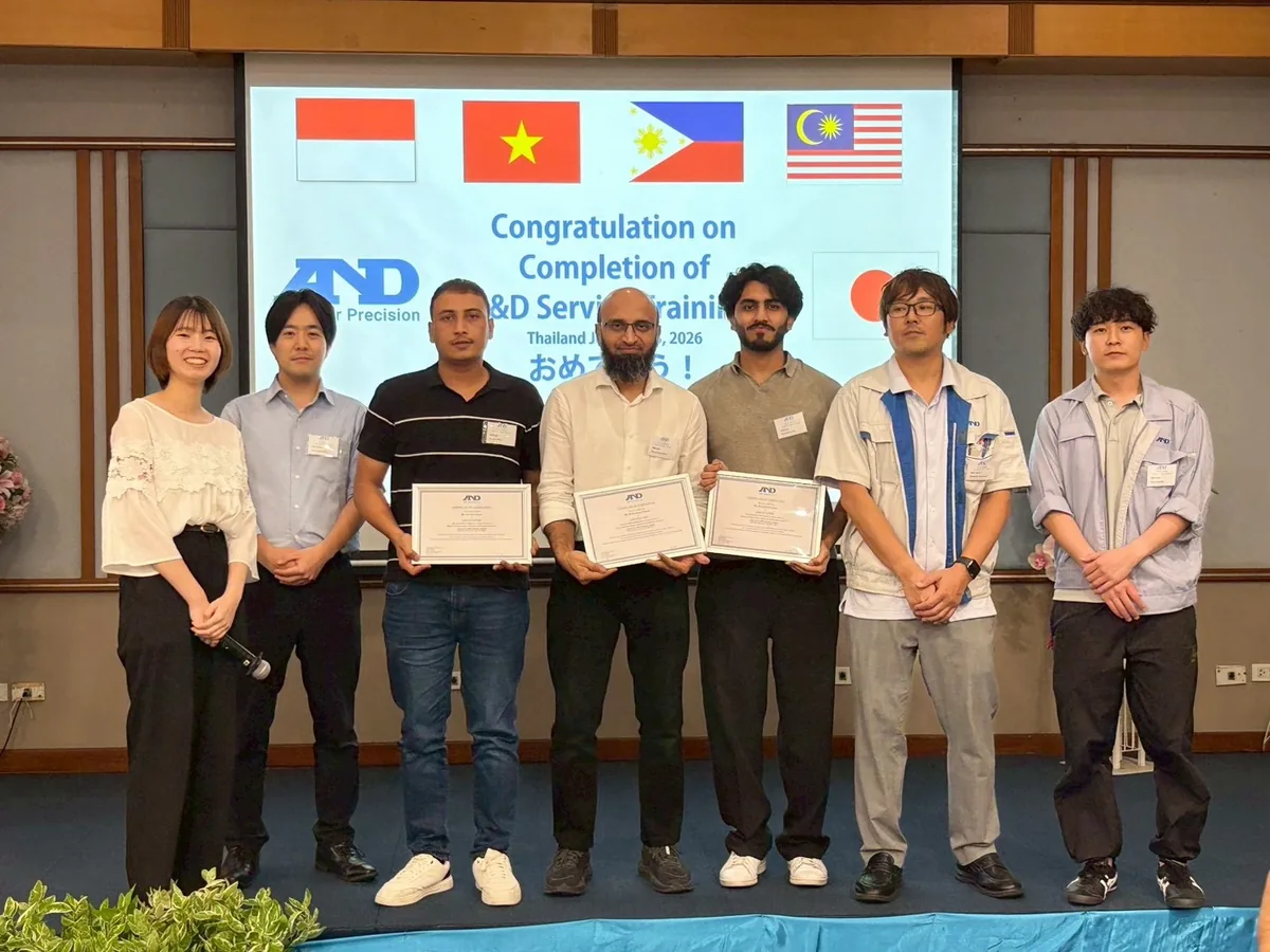 A&D Gulf engineers holding their A&D Service Training completion certificates with A&D Japan trainers in Thailand